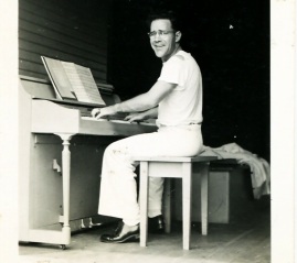photo of Doc Walker sitting at the piano