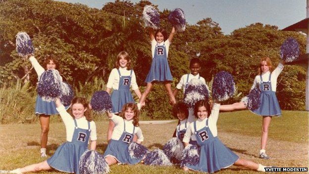 Cristobal Cheerleaders featuring their first black cheerleader