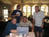 photo of group viewing the NBAers Playground Home page website on a laptop